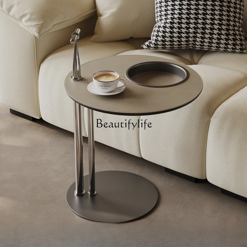 Italian minimalist stainless steel sofa edge few high-grade saddle leather round few movable mini table
Italian minimalist stainless steel sofa edge few high-grade saddle leather round few movable mini table