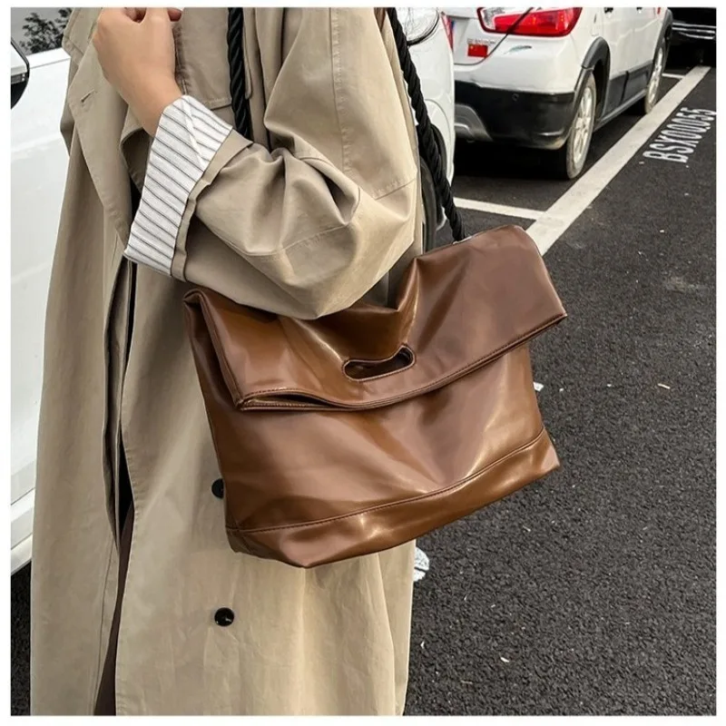 Women's Brown Glossy Faux Leather Fold-Over Tote Bag, Casual Style for Daily Errands, Weekend Outings & Everyday Work Use
Women's Brown Glossy Faux Leather Fold-Over Tote Bag, Casual Style for Daily Errands, Weekend Outings & Everyday Work Use