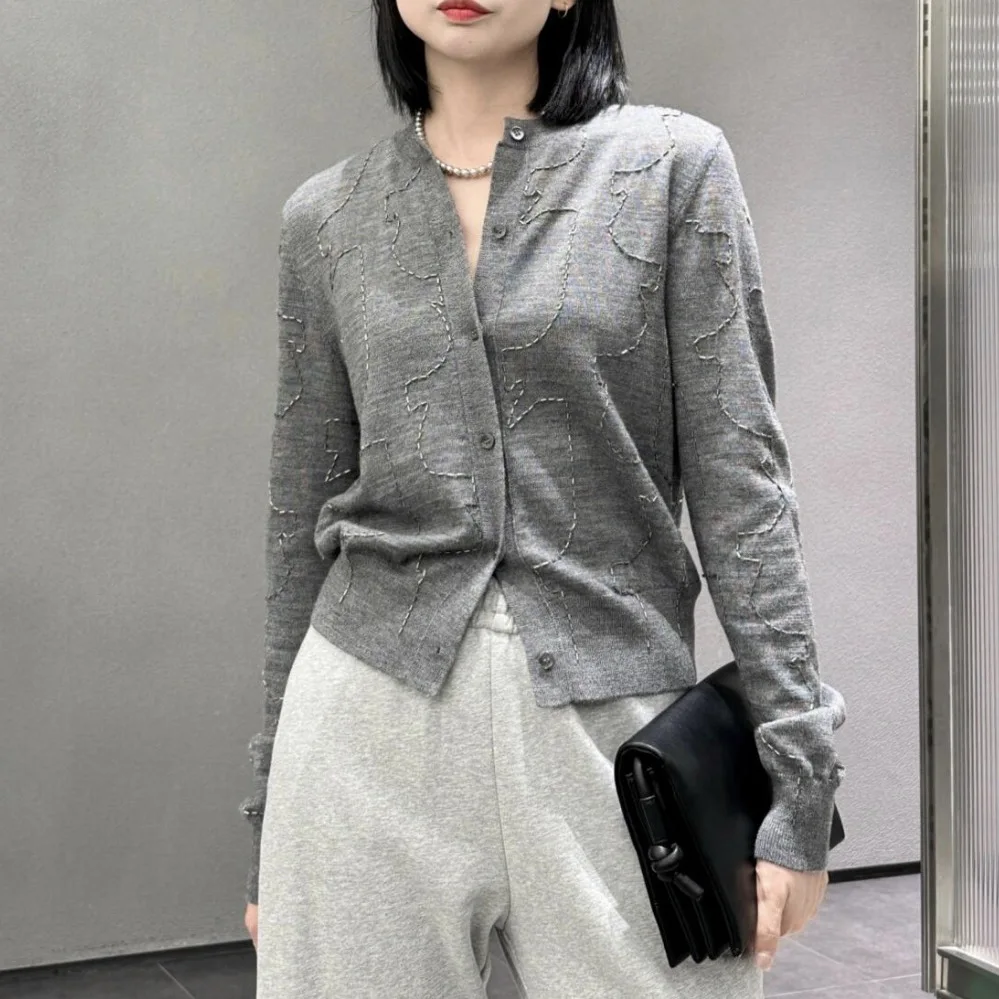 Bead tube embroidered crew neck knitted cardigan women's autumn new design niche sweater top
Bead tube embroidered crew neck knitted cardigan women's autumn new design niche sweater top
