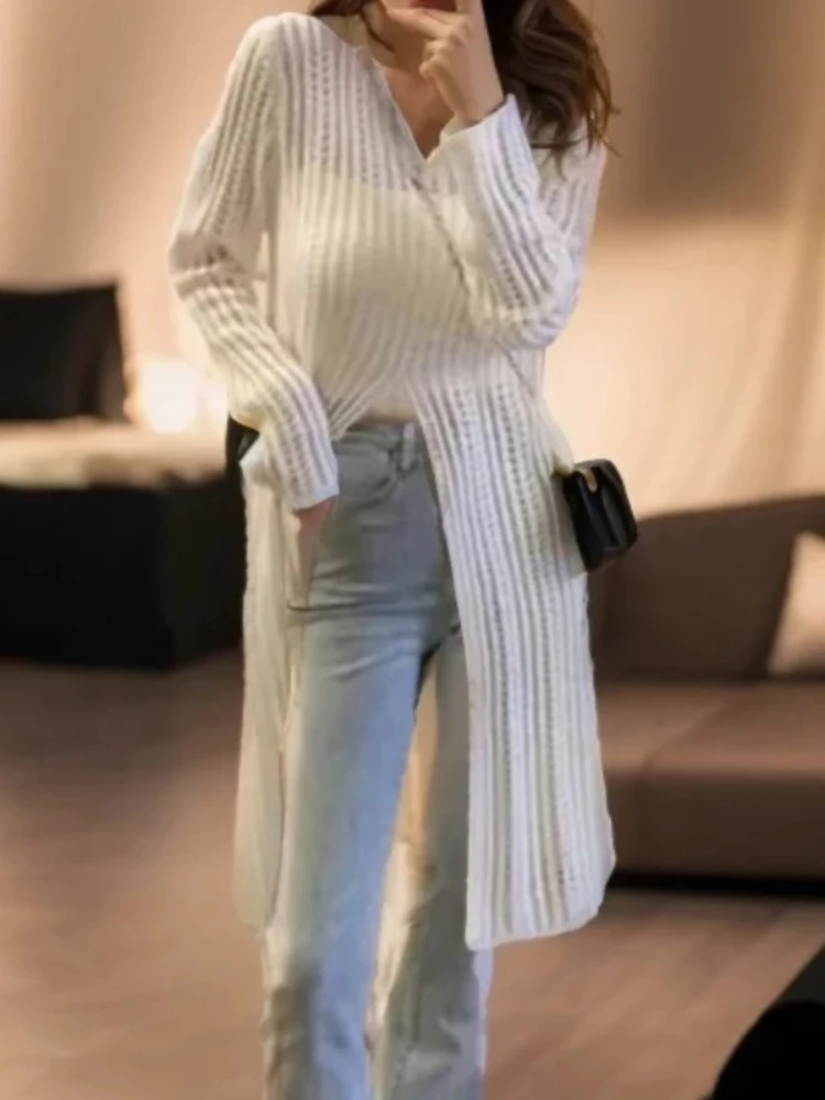 New Women's Knitted Hollow Long-sleeved Crew Neck Sweater Medium and Long Solid Color Elegant Fashion Blouse
New Women's Knitted Hollow Long-sleeved Crew Neck Sweater Medium and Long Solid Color Elegant Fashion Blouse