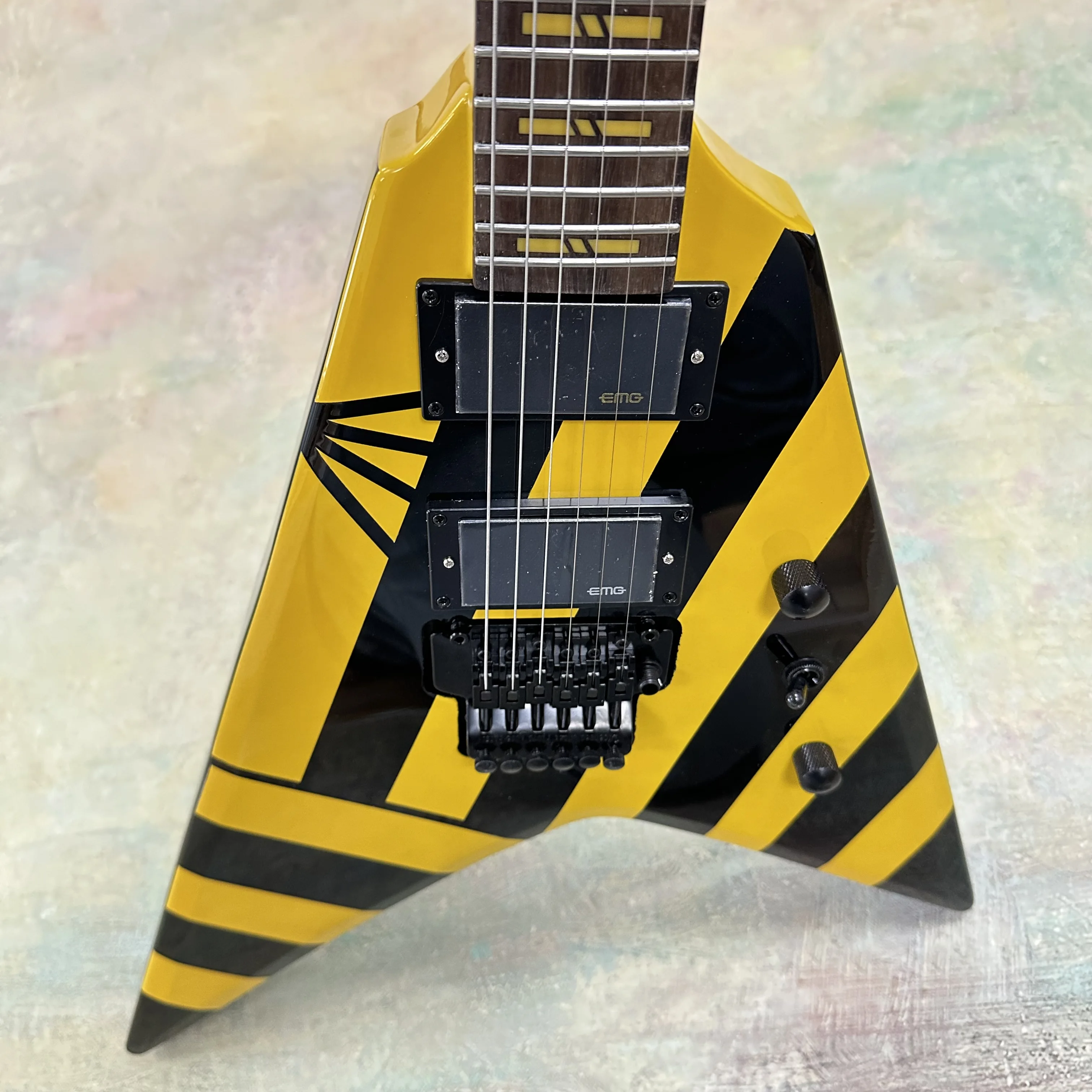 US Warehouse Fast Delivery Black & Yellow Striped V-Shaped Electric Guitar 6-String Rosewood Fingerboard Double Lock Tremolo High Output Pickups for Heavy Metal & Hard Rock In stock with free shipping
US Warehouse Fast Delivery Black & Yellow Striped V-Shaped Electric Guitar 6-String Rosewood Fingerboard Double Lock Tremolo High Output Pickups for Heavy Metal & Hard Rock In stock with free shipping