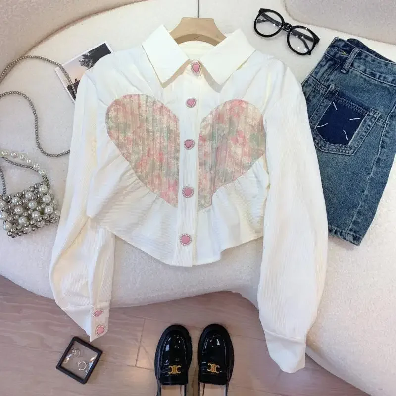 White French love shirt female design sense niche 2024 autumn new high-grade fashion temperament sweet chic blouse.
White French love shirt female design sense niche 2024 autumn new high-grade fashion temperament sweet chic blouse.