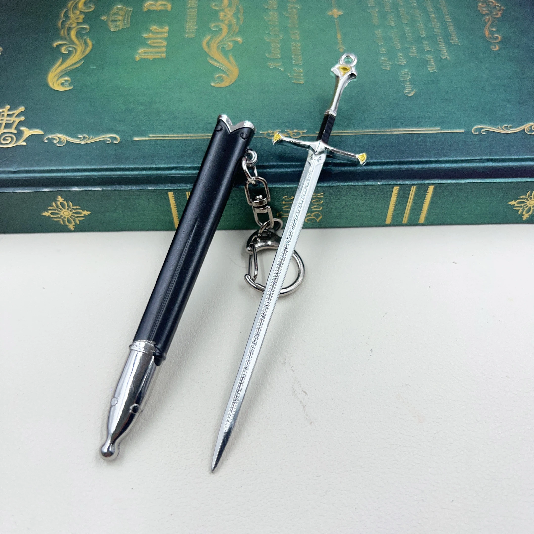 12cm Mini Narthil Sword Keychain LoTR Medieval Movie TV Peripheral All Metal Material Katana Sword Model Keychains for Fans Gift
12cm Mini Narthil Sword Keychain LoTR Medieval Movie TV Peripheral All Metal Material Katana Sword Model Keychains for Fans Gift