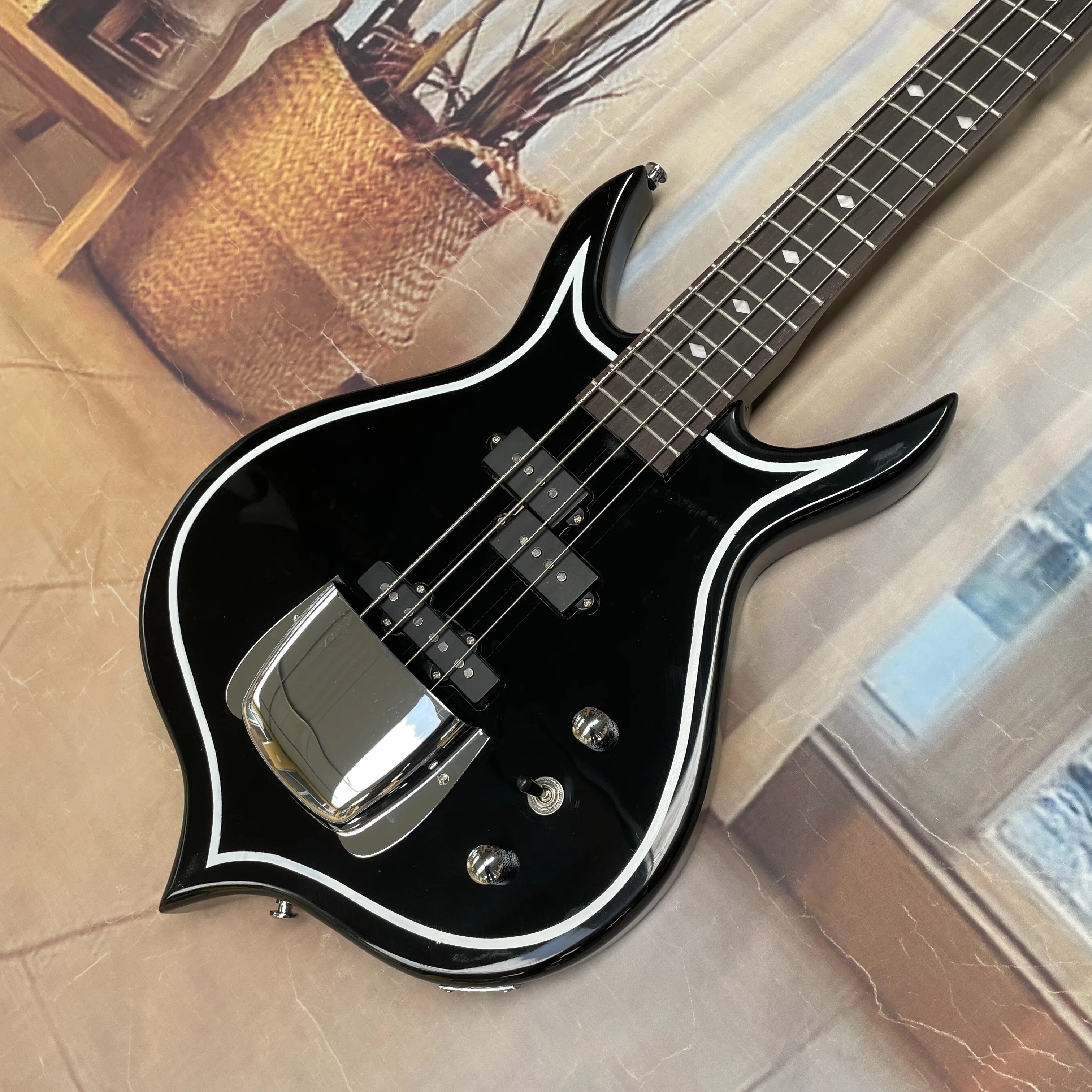 Personalized black 4-string electric bassguitar,white outline inlaid rosewood fingerboardguitars,rock stage performance guitarra
Personalized black 4-string electric bassguitar,white outline inlaid rosewood fingerboardguitars,rock stage performance guitarra