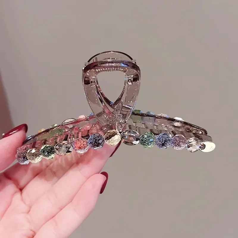 2025 New Highend Colored Rhinestone Hair Claws Multiple Styles Back of The Head Hair Grips Grade Shark Clip Hair Accessory
2025 New Highend Colored Rhinestone Hair Claws Multiple Styles Back of The Head Hair Grips Grade Shark Clip Hair Accessory