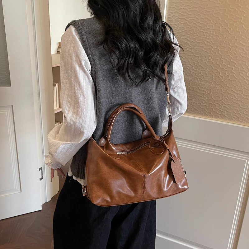 Женская винтажная сумка-бостон из искусственной кожи, средняя сумка-сэтчел, классическая сумка-тоут с верхней ручкой для работы, путешествий и повседневного использования
Женская винтажная сумка-бостон из искусственной кожи, средняя сумка-сэтчел, классическая сумка-тоут с верхней ручкой для работы, путешествий и повседневного использования