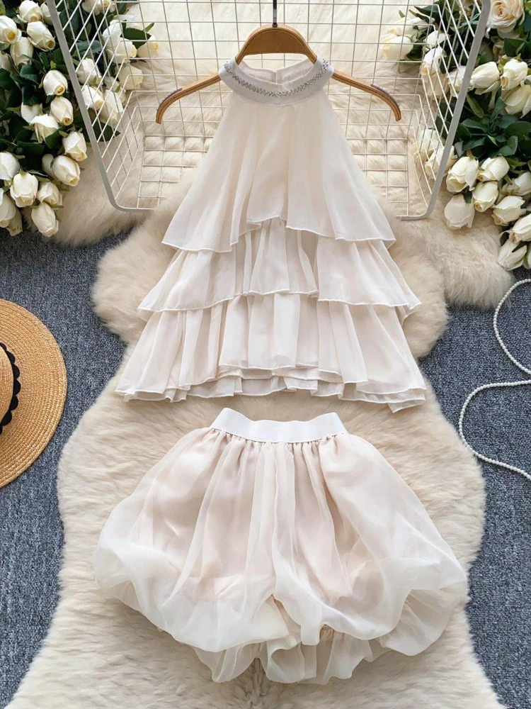 Female summer new two piece set women nail bead hanging neck sleeveless ruffled chiffon top+high waisted flower bud shorts
Female summer new two piece set women nail bead hanging neck sleeveless ruffled chiffon top+high waisted flower bud shorts
