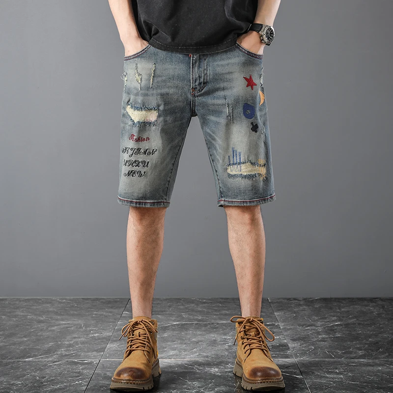 J1011Men's denim shorts men's light luxury five-minute trousers embroidered straight with the trend of fashionable holes fashion
J1011Men's denim shorts men's light luxury five-minute trousers embroidered straight with the trend of fashionable holes fashion