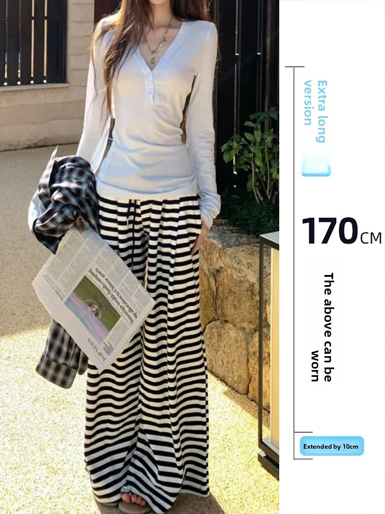 Женские свободные широкие брюки-джоггеры для ранней весны, удлиненная версия, струящиеся, скрывающие бедра, повседневные, в корейском стиле, в полоску, прямого кроя
Женские свободные широкие брюки-джоггеры для ранней весны, удлиненная версия, струящиеся, скрывающие бедра, повседневные, в корейском стиле, в полоску, прямого кроя