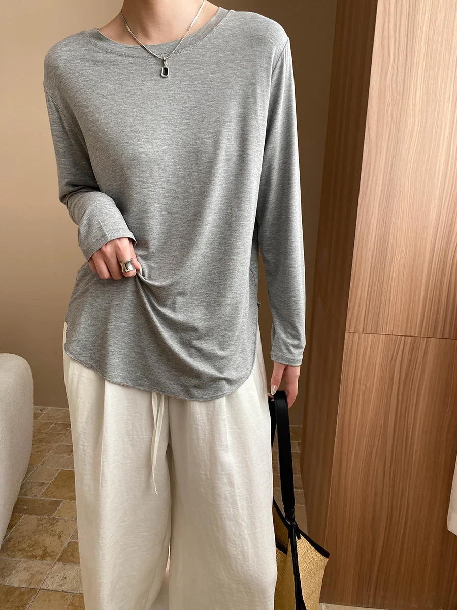Spring and summer women's casual solid color round neck long sleeved loose T-shirt
Spring and summer women's casual solid color round neck long sleeved loose T-shirt