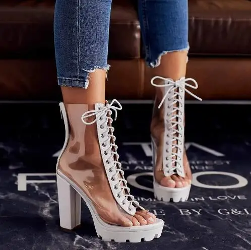 Женские модные белые и черные прозрачные ботильоны из ПВХ на платформе с перекрестной шнуровкой и квадратным каблуком
Женские модные белые и черные прозрачные ботильоны из ПВХ на платформе с перекрестной шнуровкой и квадратным каблуком