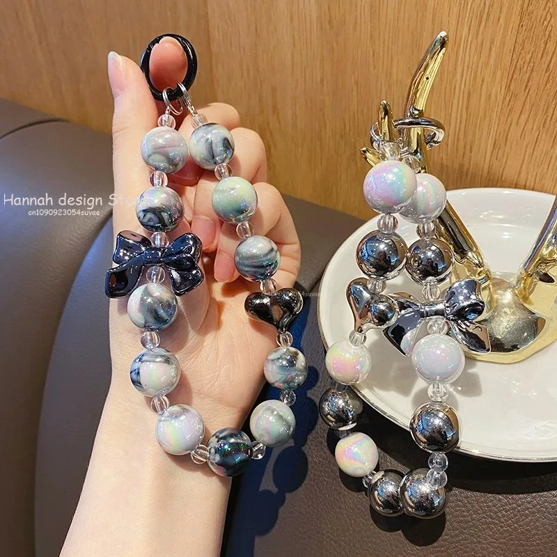 Y2K чехол для телефона с бантом и бисером, ремешок, стильная цепочка для телефона с бусинами, браслет на запястье, анти-потерянный ремешок для телефона, подвеска для наушников, брелок
Y2K чехол для телефона с бантом и бисером, ремешок, стильная цепочка для телефона с бусинами, браслет на запястье, анти-потерянный ремешок для телефона, подвеска для наушников, брелок