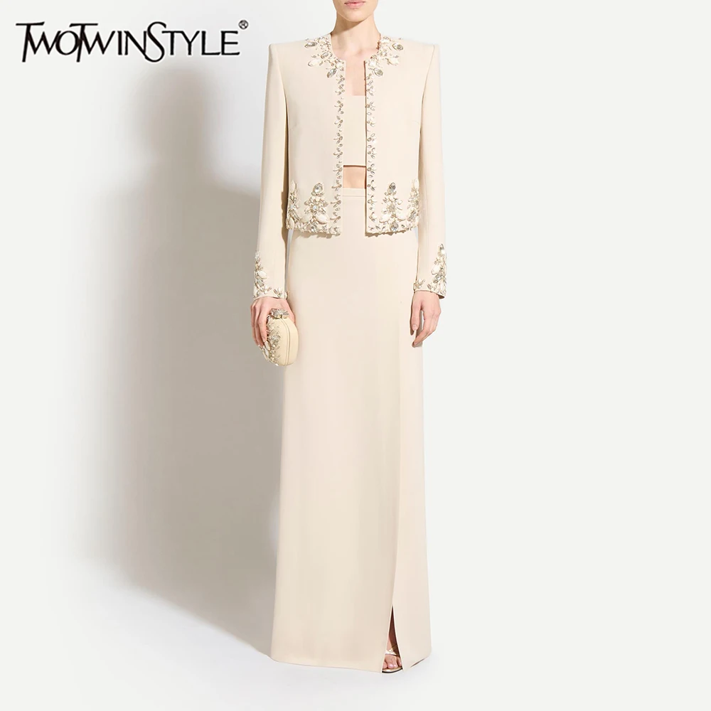 TWOTWINSTYLE Solid Slimming Two Piece Sets for Women Round Neck Long Sleeves Patchwork Bead Top High Waist Split Skirt Female
TWOTWINSTYLE Solid Slimming Two Piece Sets for Women Round Neck Long Sleeves Patchwork Bead Top High Waist Split Skirt Female