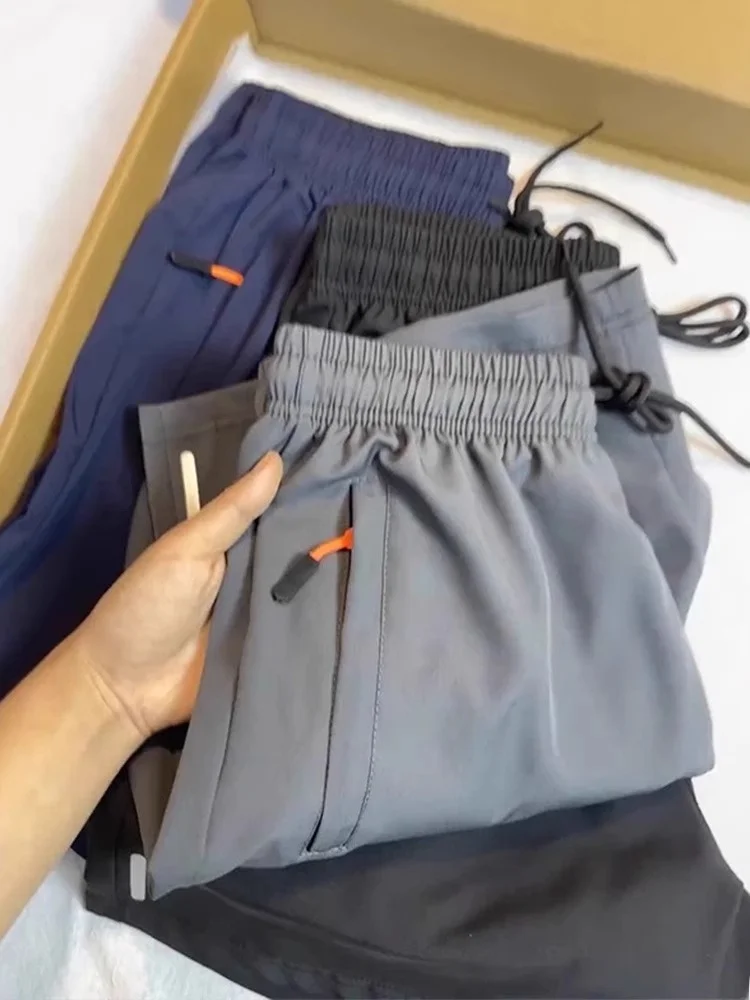 Ey Ice Silk Qui Dry orts Мужские легкие дышащие спортивные брюки для бега для фитнеса Nylon Beach Four Five orts
Ey Ice Silk Qui Dry orts Мужские легкие дышащие спортивные брюки для бега для фитнеса Nylon Beach Four Five orts