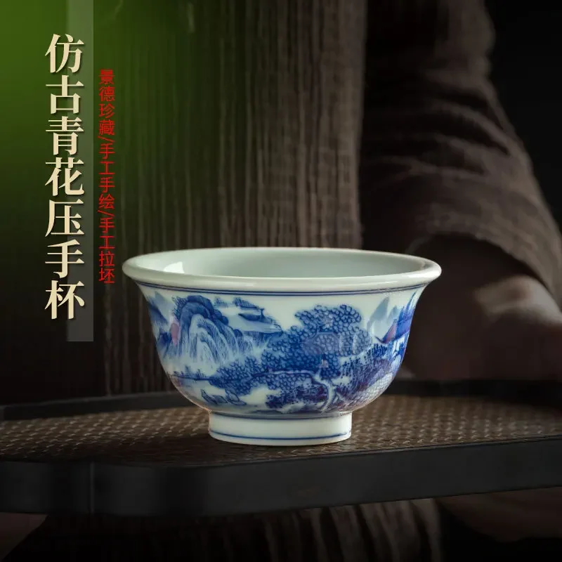 Jingdezhen high-end handmade ceramic master cup single cup hand-painted blue and white landscape pressure hand cup retro
Jingdezhen high-end handmade ceramic master cup single cup hand-painted blue and white landscape pressure hand cup retro