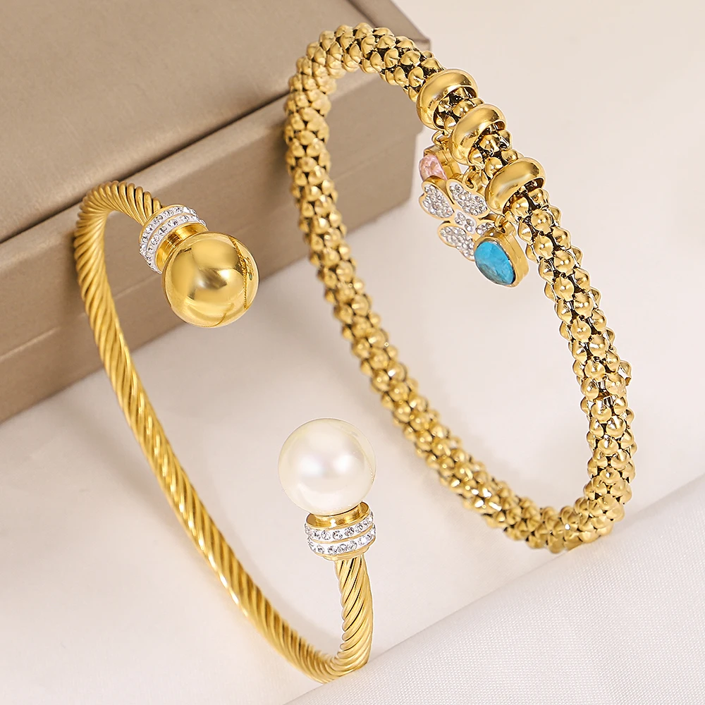 2PCS Women's Gold Color Bangle New Unique Inlaid Ball Pearl Flower Pendant Stainless Steel Bracelet Matching Accessories Gift
2PCS Women's Gold Color Bangle New Unique Inlaid Ball Pearl Flower Pendant Stainless Steel Bracelet Matching Accessories Gift