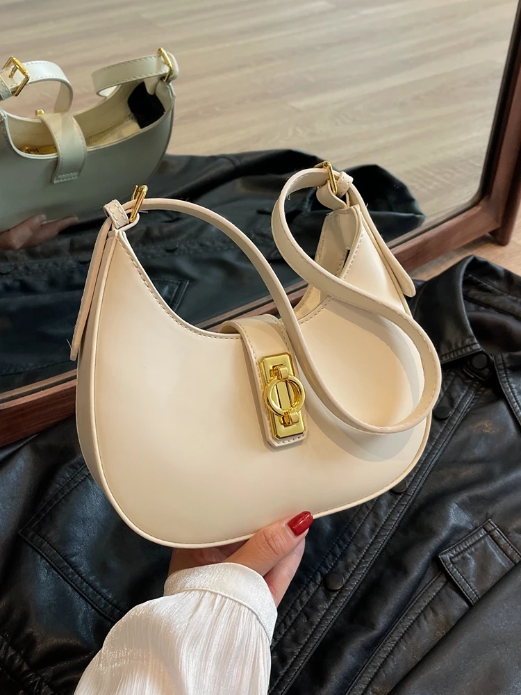 Women New Work Commuting One Shoulder Underarm Bag Personality Lock Buckle Versatile Crossbody Bag Fashion Solid Color Handbag
Women New Work Commuting One Shoulder Underarm Bag Personality Lock Buckle Versatile Crossbody Bag Fashion Solid Color Handbag