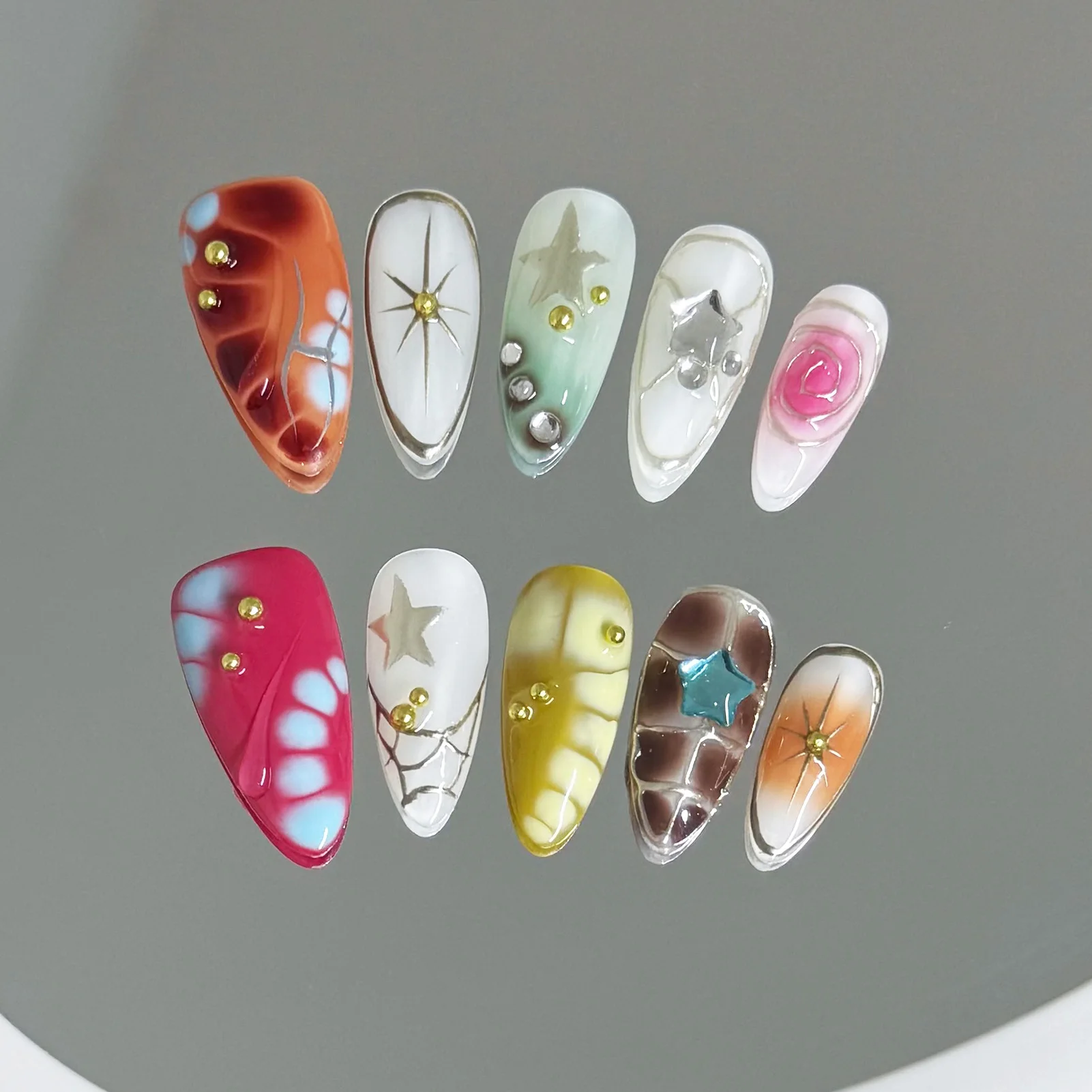 Y2K Girls Handmade Press On Nails 10Pcs Colorful Almond Fake Nails Charms Bead Star Designs Reusable Acrylic False Nails
Y2K Girls Handmade Press On Nails 10Pcs Colorful Almond Fake Nails Charms Bead Star Designs Reusable Acrylic False Nails
