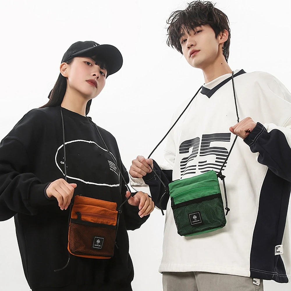 Multifunctional Crossbody Phone Pouch Sports Korean Style Nylon Shoulder Bag Street Style Solid Color Small Square Bag Man
Multifunctional Crossbody Phone Pouch Sports Korean Style Nylon Shoulder Bag Street Style Solid Color Small Square Bag Man