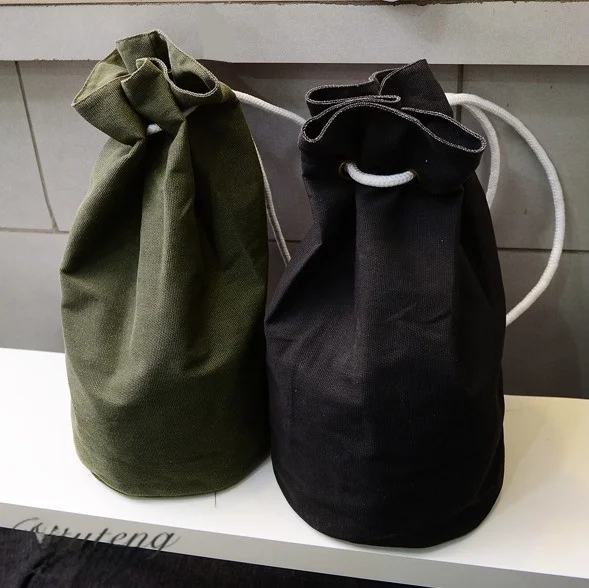 Canvas Sports Fitness Backpack Tubular Rope Buckle Bucket Bag Travel Bag Men's Double-Strap Zipper Closure Casual Shoulder Bag
Canvas Sports Fitness Backpack Tubular Rope Buckle Bucket Bag Travel Bag Men's Double-Strap Zipper Closure Casual Shoulder Bag