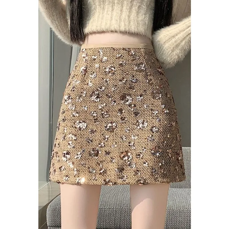 Golden Small Fragrant Sequined Skirt Autumn and Winter Korean Version, New Small A-word Skirt High Waist Hip-wrapped Short Skirt
Golden Small Fragrant Sequined Skirt Autumn and Winter Korean Version, New Small A-word Skirt High Waist Hip-wrapped Short Skirt
