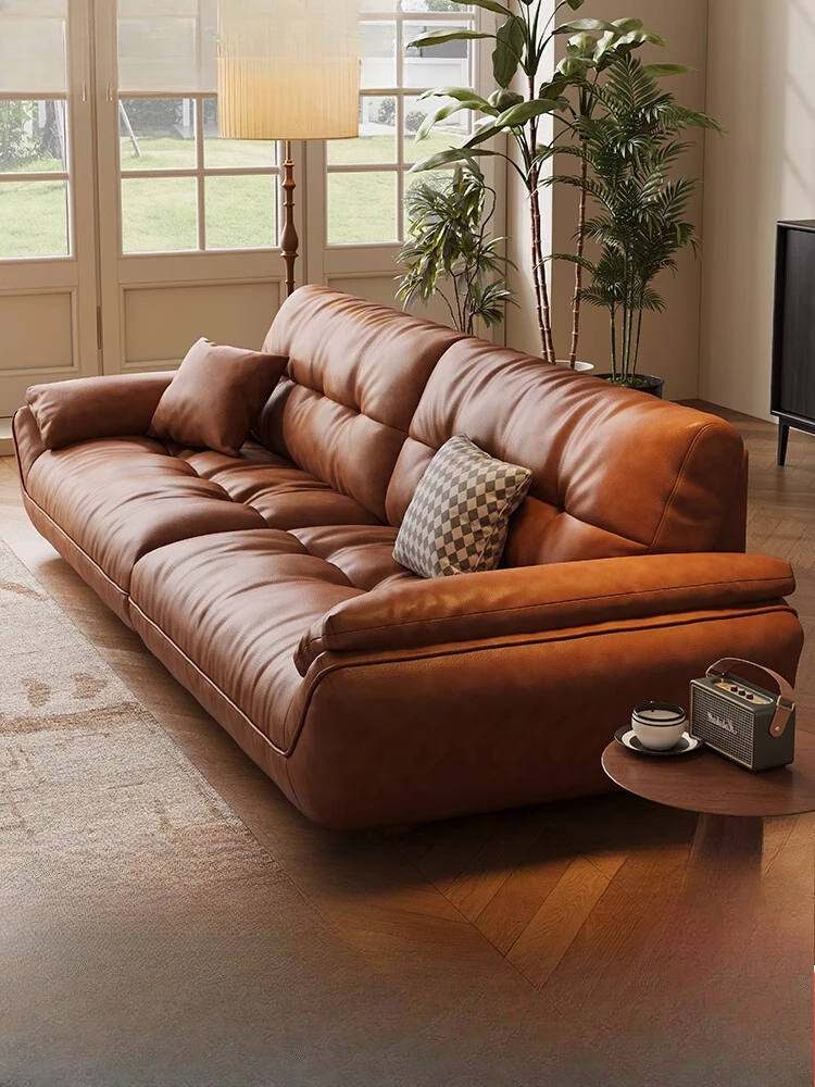 Simple modern leather sofa first layer cowhide Italian minimalist light luxury straight row down sailboat cloud sofa living room
Simple modern leather sofa first layer cowhide Italian minimalist light luxury straight row down sailboat cloud sofa living room