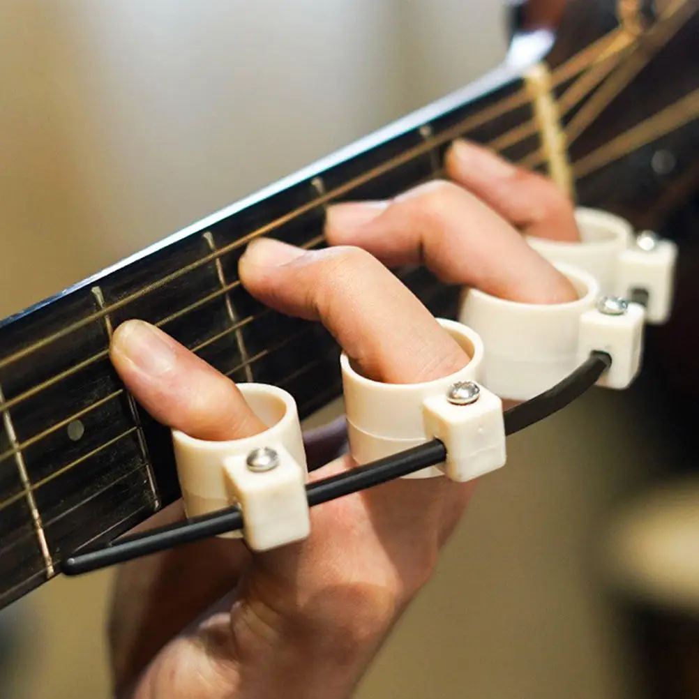 Finger Expansion Sleeves Extensor Trainer Set for Guitar Piano Ukulele Bass Players Adjustable Support Rods 4 Protectors
Finger Expansion Sleeves Extensor Trainer Set for Guitar Piano Ukulele Bass Players Adjustable Support Rods 4 Protectors