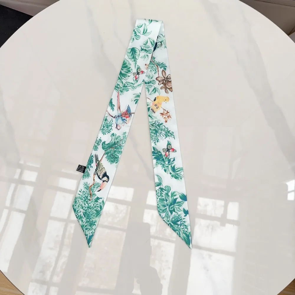 Jungle Parrot Print Women Scarf Silk Material Narrow Long Neck Scarves Versatile High-end Feel Silk Scarf Women Accessories
Jungle Parrot Print Women Scarf Silk Material Narrow Long Neck Scarves Versatile High-end Feel Silk Scarf Women Accessories