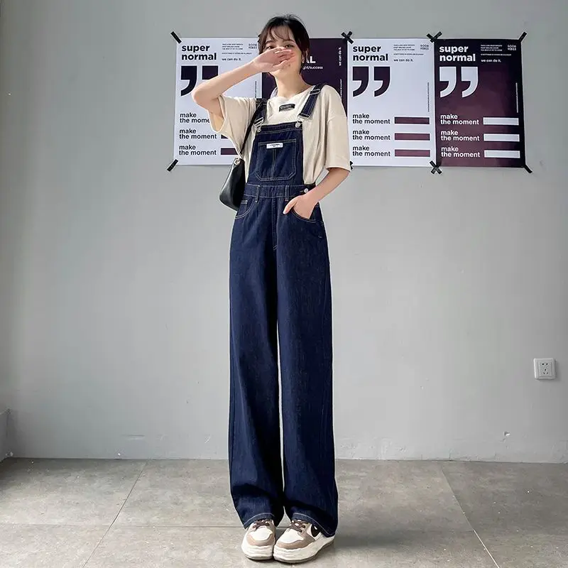 New Hong Kong Style Denim Overalls Dress Women's One-shoulder Jumpsuit Small Loose Nine-point Straight-leg Pants
New Hong Kong Style Denim Overalls Dress Women's One-shoulder Jumpsuit Small Loose Nine-point Straight-leg Pants