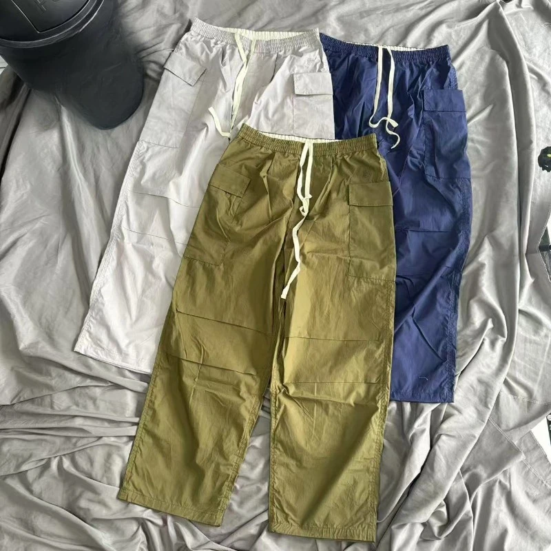 Thin Nanamica Pants Waterproof Loose Versatile Cargo Pants Men Women Casual Drawstring Zipper Design Straight Loose Trousers
Thin Nanamica Pants Waterproof Loose Versatile Cargo Pants Men Women Casual Drawstring Zipper Design Straight Loose Trousers