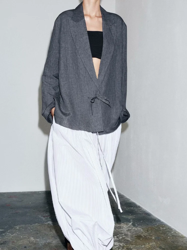 European and American style summer new fashion trend women's casual temperament simple loose linen blended suit jacket
European and American style summer new fashion trend women's casual temperament simple loose linen blended suit jacket