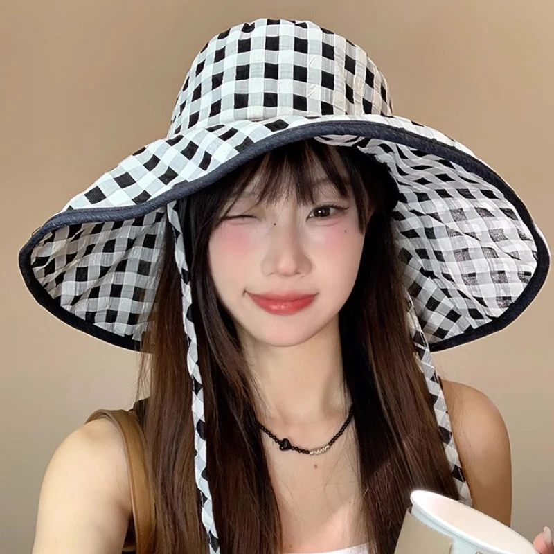 Classic Black and White Plaid Streamer Sun Hats Women Summer Seaside Vacation Fashion Big Brim Sun Protection Bucket Hat
Classic Black and White Plaid Streamer Sun Hats Women Summer Seaside Vacation Fashion Big Brim Sun Protection Bucket Hat