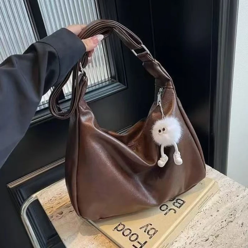 Осенняя большая сумка в стиле ретро, большая вместительная женская сумка из искусственной кожи на одно плечо, сумки-хобо, дизайнерская простая сумка для покупок
Осенняя большая сумка в стиле ретро, большая вместительная женская сумка из искусственной кожи на одно плечо, сумки-хобо, дизайнерская простая сумка для покупок