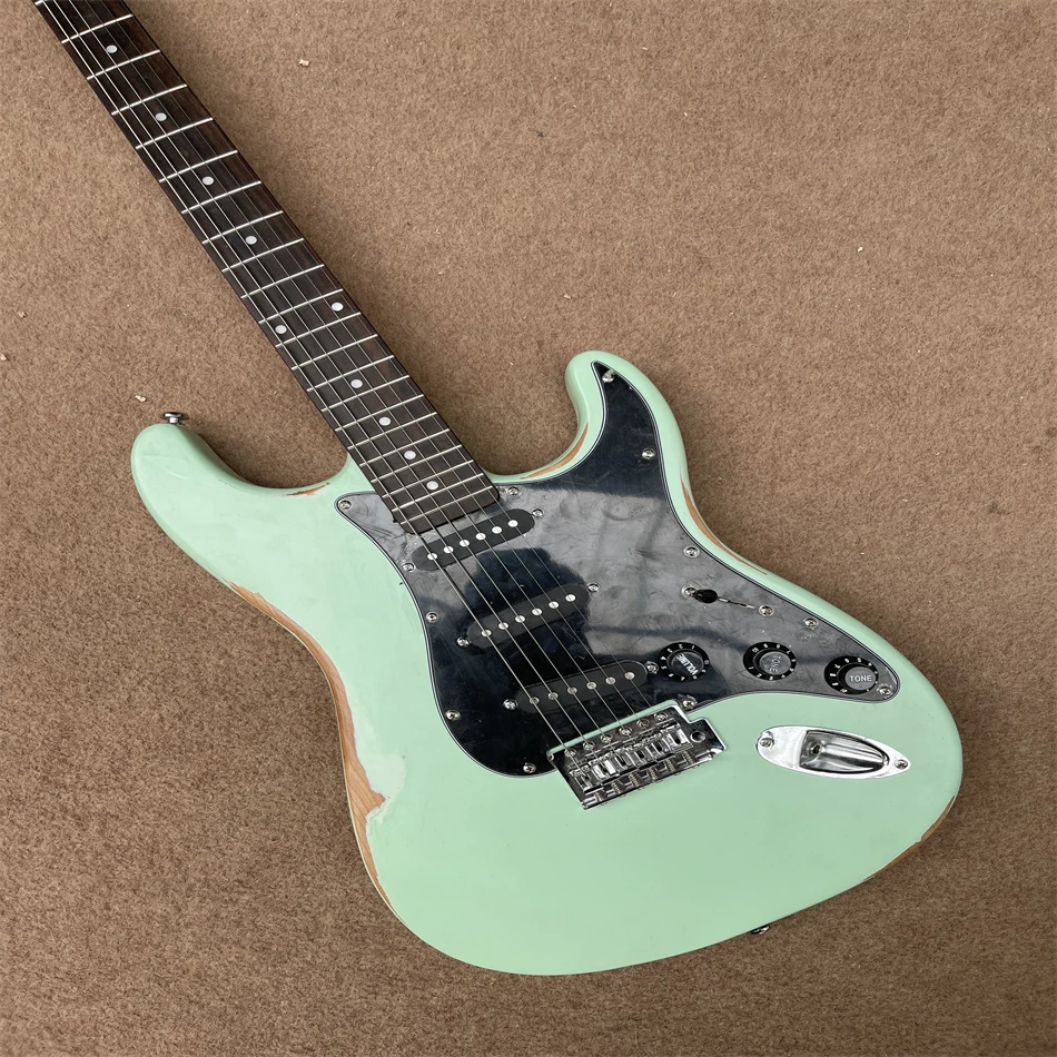 High quality electric guitar, antique antique, light green, silver hardware, free shipping, can be customized
High quality electric guitar, antique antique, light green, silver hardware, free shipping, can be customized