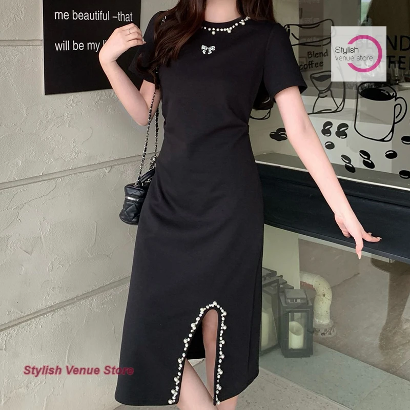 Korean style temperament Joker black short-sleeved dress female summer fashion beading design sense niche slim casual dress.
Korean style temperament Joker black short-sleeved dress female summer fashion beading design sense niche slim casual dress.