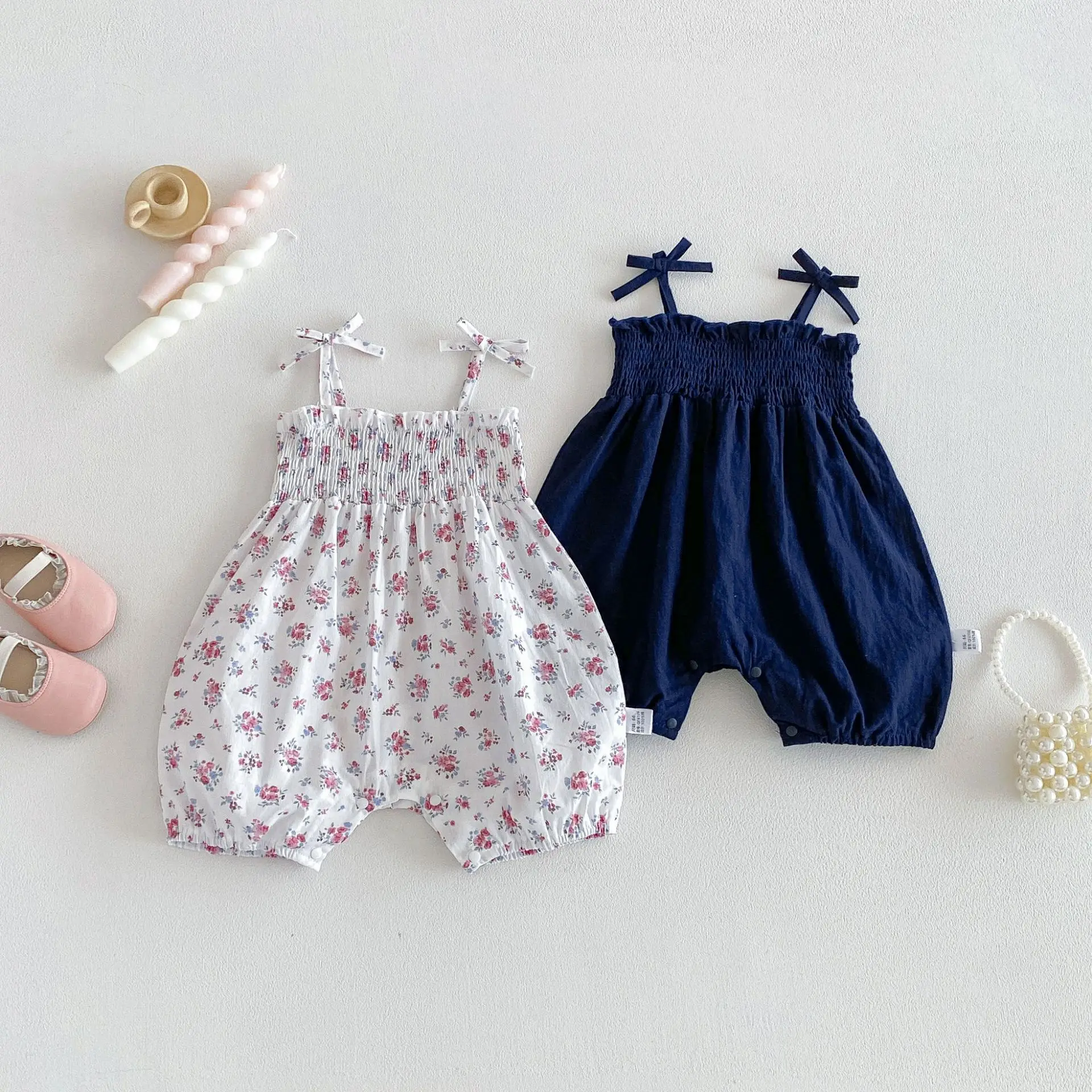 2026 New Summer 0-2Y Baby Clothes Fresh Floral/Solid Color Girls Romper with Bow Sling Smocked Elastic Waist Jumpsuit
2026 New Summer 0-2Y Baby Clothes Fresh Floral/Solid Color Girls Romper with Bow Sling Smocked Elastic Waist Jumpsuit