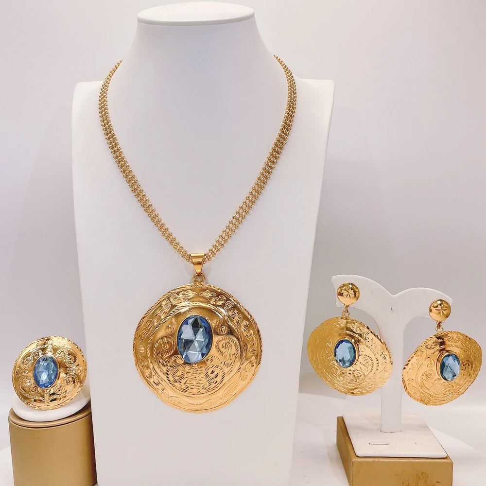 Ювелирный набор в африканском стиле из Дубая: колье, серьги и кольцо, позолоченные 24-каратным золотом, свадебные аксессуары для невесты в эфиопском стиле.
Ювелирный набор в африканском стиле из Дубая: колье, серьги и кольцо, позолоченные 24-каратным золотом, свадебные аксессуары для невесты в эфиопском стиле.