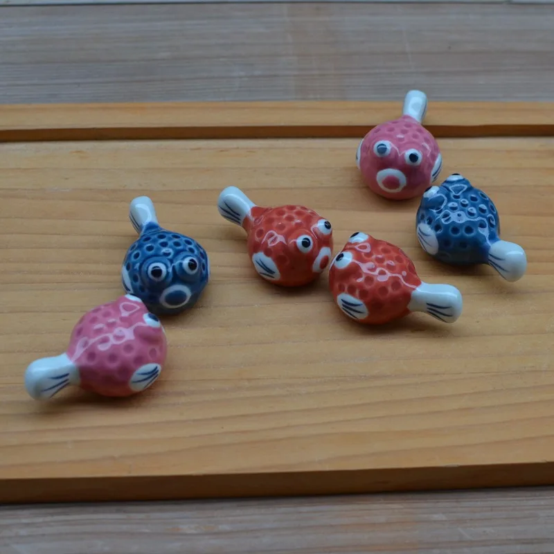 Pack of 7 pcs Cute Customized Puffer Fish Ceramic Chopsticks Stand Holder Japanese Style Hand-painted
Pack of 7 pcs Cute Customized Puffer Fish Ceramic Chopsticks Stand Holder Japanese Style Hand-painted