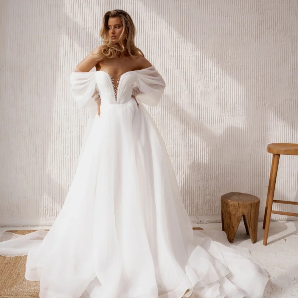 Boho White Wedding Dresses Sweetheart Off Shoulder Vestido de Noche Beading Gitter Full Sleeves Customized Robes de mariée
Boho White Wedding Dresses Sweetheart Off Shoulder Vestido de Noche Beading Gitter Full Sleeves Customized Robes de mariée