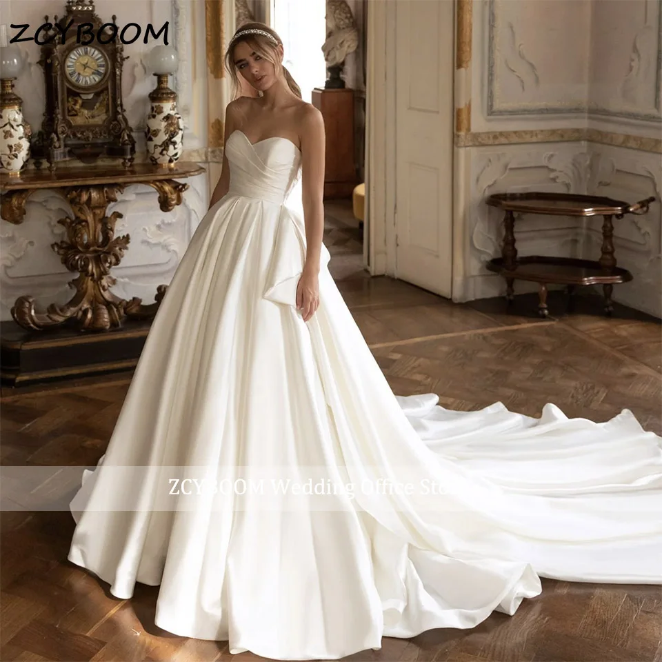 Elegant Sweetheart Satin A-Line Sleeveless Wedding Dress 2025 Princess Backless Chapel Train Women Bride Gowns Vestido De Noiva
Elegant Sweetheart Satin A-Line Sleeveless Wedding Dress 2025 Princess Backless Chapel Train Women Bride Gowns Vestido De Noiva