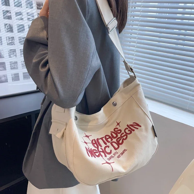 Female Big Capacity Canvas Fabric Embroidery Hobo Slouchy Shoulder Bag 90s Fashion Y2K Medium Size School Book Crossbody Bag
Female Big Capacity Canvas Fabric Embroidery Hobo Slouchy Shoulder Bag 90s Fashion Y2K Medium Size School Book Crossbody Bag