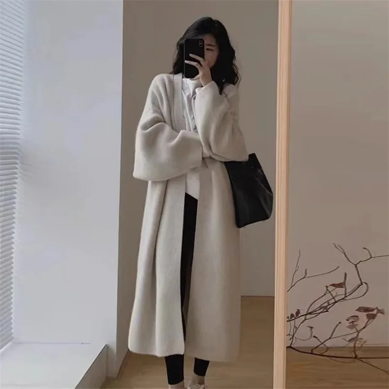 Autumn and Winter New Solid Color Long Loose Knitted Cardigan Slouchy Style Slim Over Knee Thick Sweater Coat
Autumn and Winter New Solid Color Long Loose Knitted Cardigan Slouchy Style Slim Over Knee Thick Sweater Coat