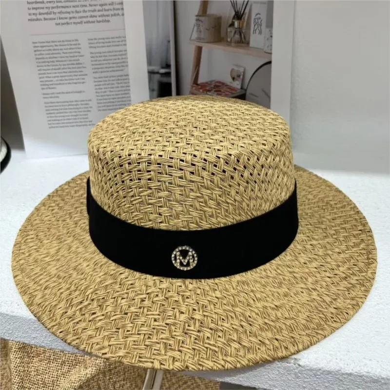 A flat-topped hat for women to sunshade and protect the versatile wide-brimmed seaside vacations hand-woven hats
A flat-topped hat for women to sunshade and protect the versatile wide-brimmed seaside vacations hand-woven hats