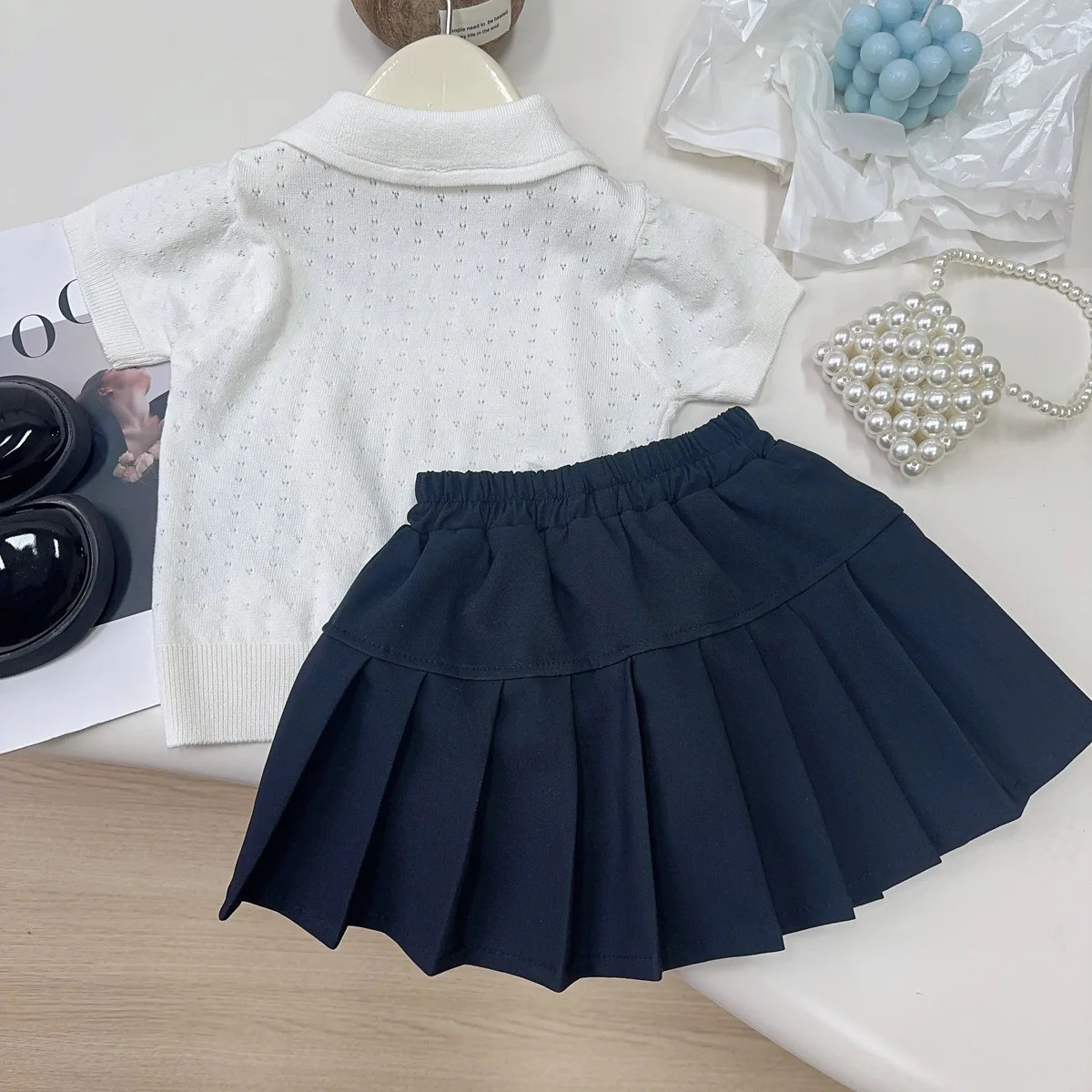 Girls' Knitted Sweater Tank Top Summer New Style Little Girls' Elegant Pleated 2025 Half Length Skirt Set
Girls' Knitted Sweater Tank Top Summer New Style Little Girls' Elegant Pleated 2025 Half Length Skirt Set