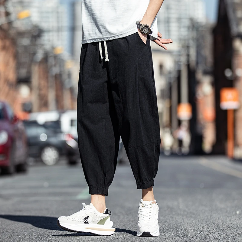 Летние тонкие хлопковые льняные брюки на семь футов, мужские свободные широкие брюки-морковки, повседневные брюки в стиле Харадзюку, молодежный модный бренд
Летние тонкие хлопковые льняные брюки на семь футов, мужские свободные широкие брюки-морковки, повседневные брюки в стиле Харадзюку, молодежный модный бренд