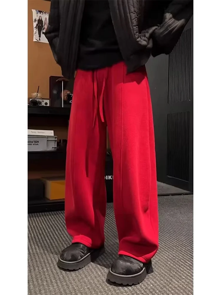 Новогодние красные свободные широкие мужские зимние спортивные штаны с драпировкой на подкладке, прямые повседневные брюки для пары Lazy Sle
Новогодние красные свободные широкие мужские зимние спортивные штаны с драпировкой на подкладке, прямые повседневные брюки для пары Lazy Sle