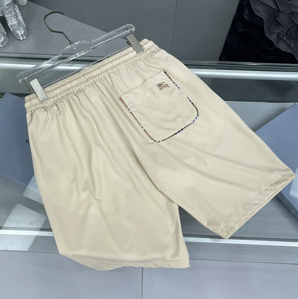 Новинка лета: комфортные высококачественные мужские шорты с вышивкой, повседневные пляжные брюки-миди, модные городские стильные штаны.
Новинка лета: комфортные высококачественные мужские шорты с вышивкой, повседневные пляжные брюки-миди, модные городские стильные штаны.