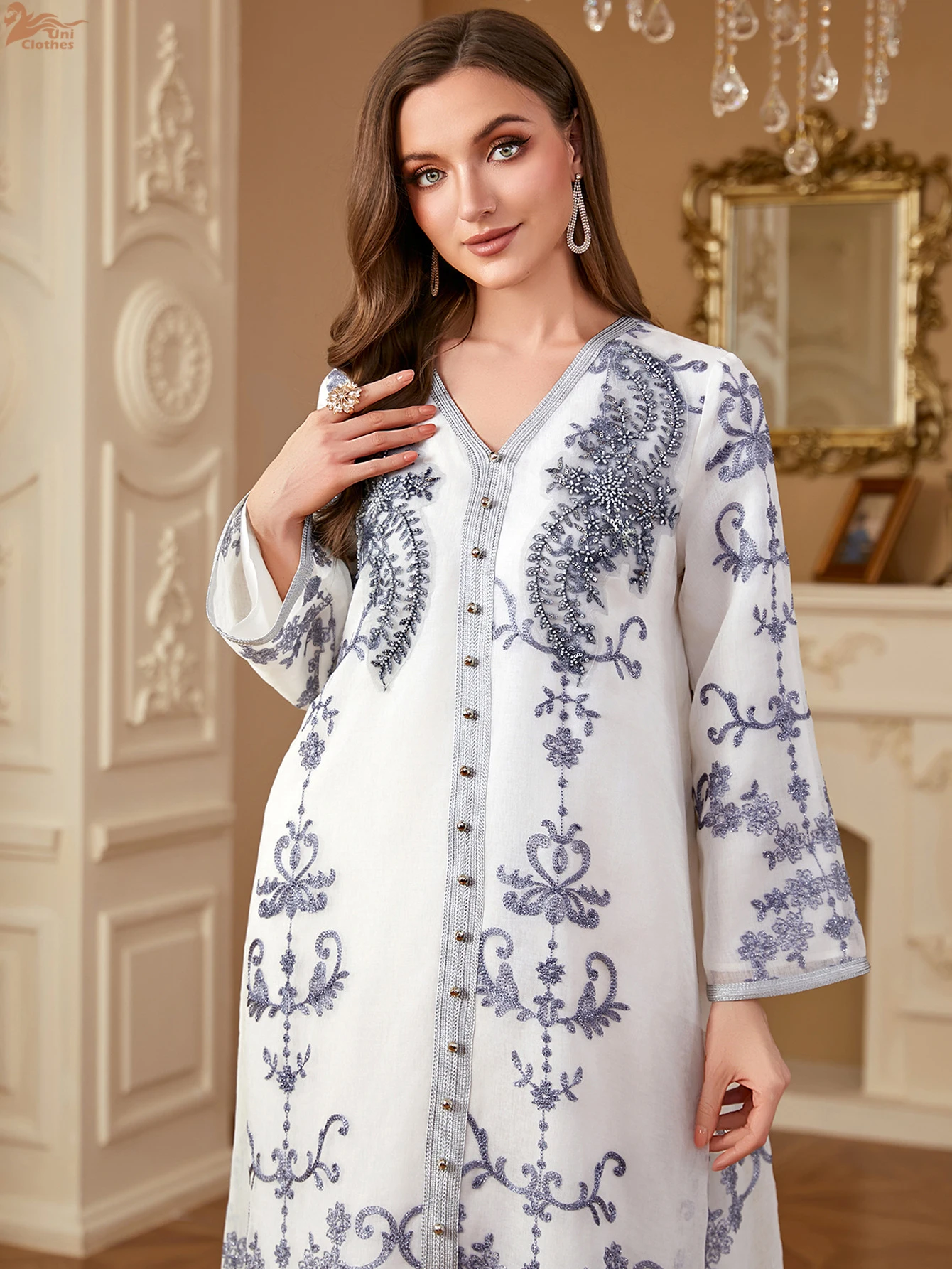 Платье Uni Dubai с цветочной вышивкой, мусульманский кафтан из бисера, v-образный вырез, украшенный стразами, абайя, марокканская женская одежда
Платье Uni Dubai с цветочной вышивкой, мусульманский кафтан из бисера, v-образный вырез, украшенный стразами, абайя, марокканская женская одежда