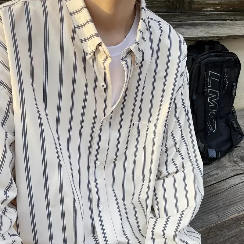 Lapel Striped Shirt Men's Clothing Long-sleeved Shirt Loose Casual Jacket Cardigan Fashion Casual Top
Lapel Striped Shirt Men's Clothing Long-sleeved Shirt Loose Casual Jacket Cardigan Fashion Casual Top
