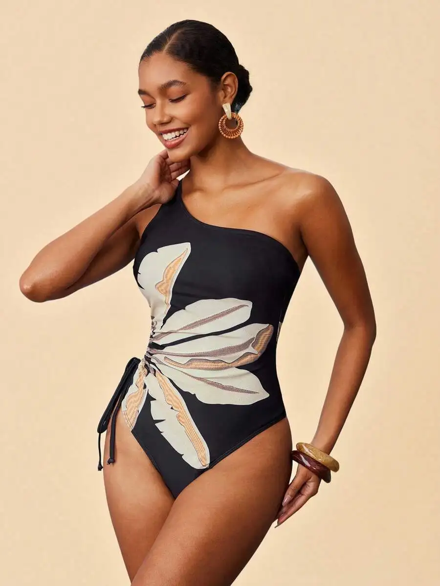 One-Piece Swimsuit With Floral Print And Side Tie Waist
One-Piece Swimsuit With Floral Print And Side Tie Waist